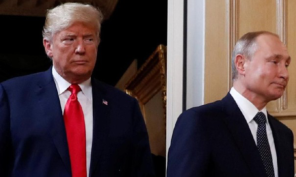 Presiden AS Donald Trump dan Presiden Rusia Vladimir Putin (Foto: REUTERS/Kevin Lamarque)