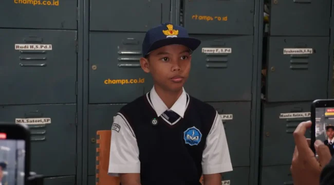 Muhammad Tris Akbarullah, siswa kelas 7.I di SMP Citra Bangsa asal Kelurahan Grogol yang mendapatkan manfaat dari adanya program RSSG. (Foto - Diskominfo Depok)