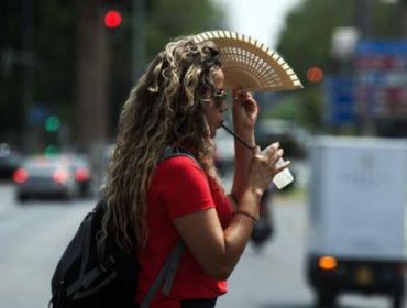 Ilustrasi. Gelombang panas melanda Malaysia, dengan Kuala Lumpur dan Kedah dalam status peringatan. Indonesia diperkirakan akan mengalami suhu di atas normal mulai April. (Foto: AFP/CRISTINA QUICLER)