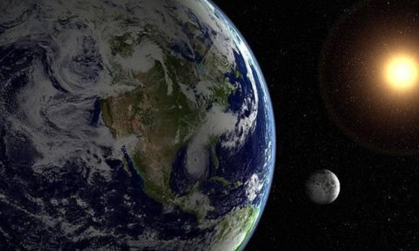 Ilustrasi Bumi, Bulan, dan Matahari di luar angkasa. (Foto: Getty Images/photovideostock)