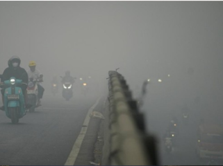 Kualitas udara di Palembang membaik dari kategori berbahaya menjadi tidak 
sehat. Penurunan ini berkat operasi modifikasi cuaca untuk atasi kabut asap. 
(FOTO:REUTERS/Abriansyah Liberto).
